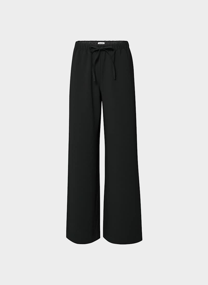The Lodge Pant - Crepette (coordinating knit-feel travel pant, worn to complete the knit-on-knit travel look)
