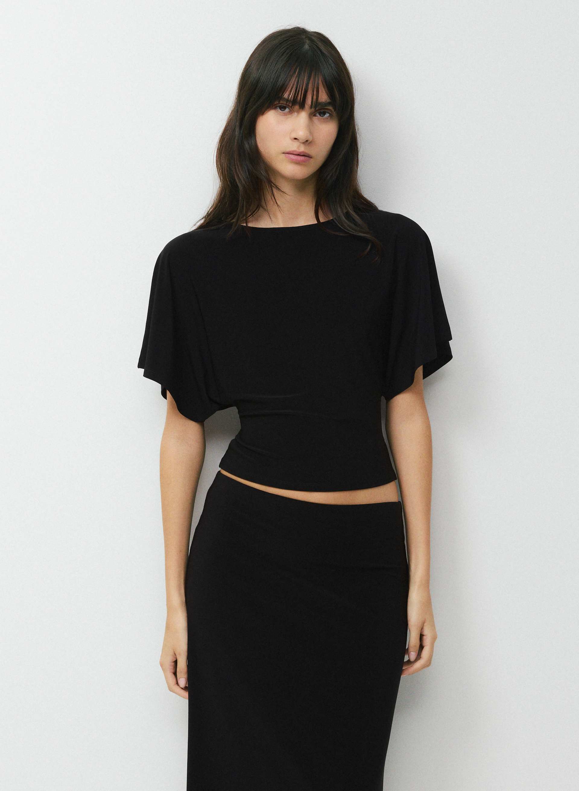 SMOOTH MATTER™ GINGER TOP - Unlined, semi-sheer drapey jersey boatneck top with tie detail. 