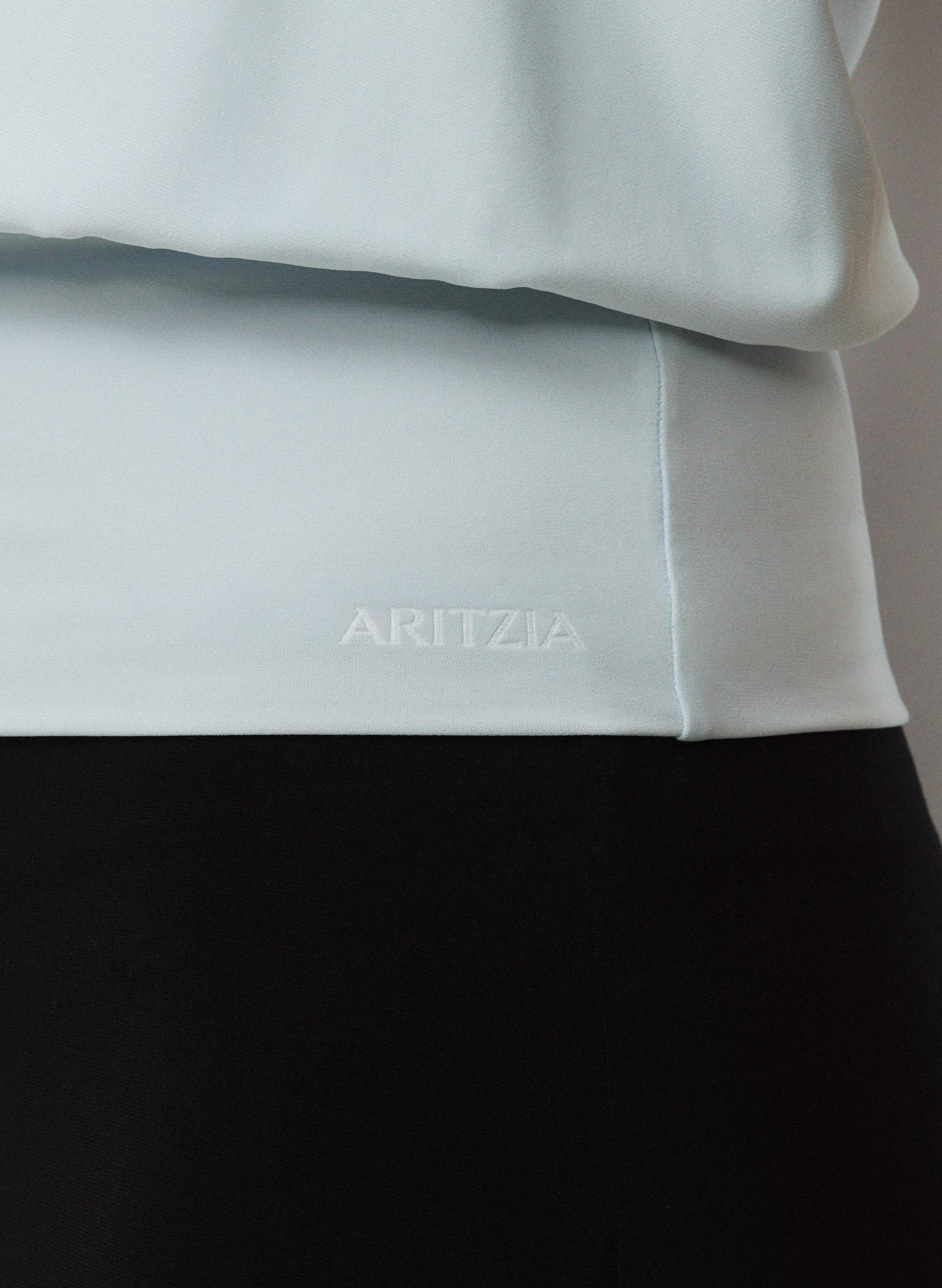 SMOOTH MATTER™ MIDNIGHT HALTER TOP | Aritzia