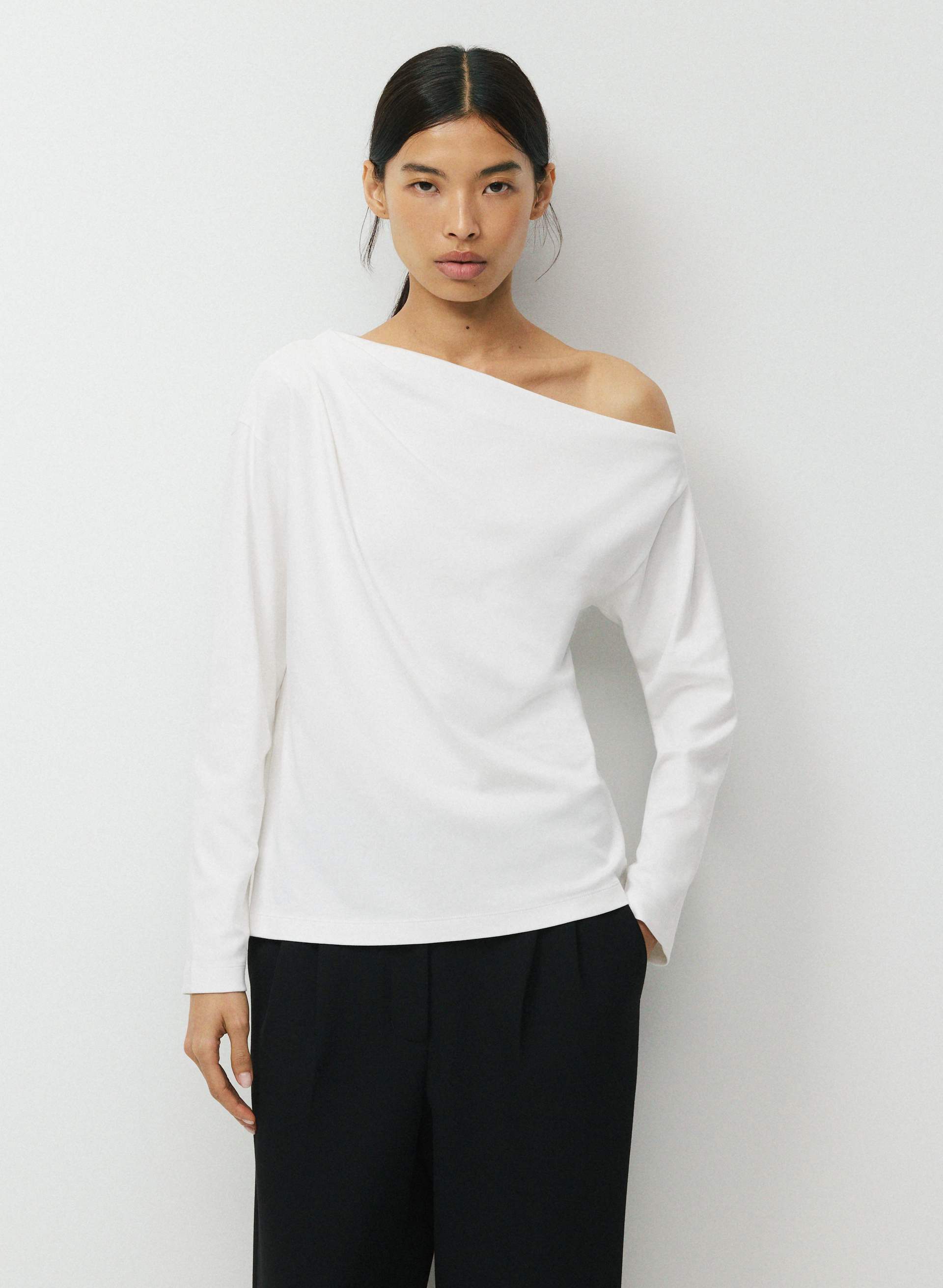 INTERLOCK COTTON SCRIPT LONGSLEEVE TOP - Double-knit 100% cotton one-shoulder top. 