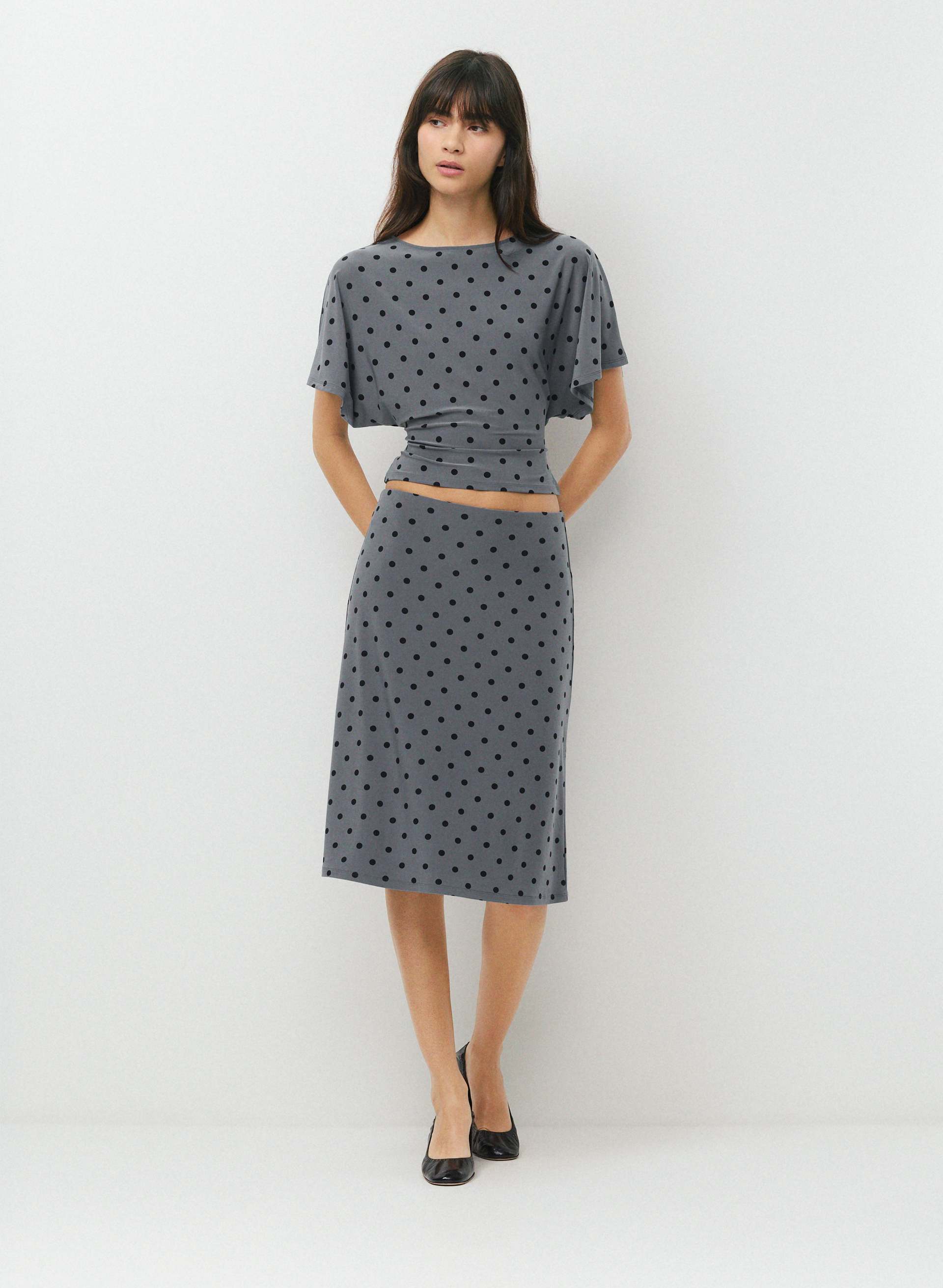 SMOOTH MATTER™ GINGER TOP - Unlined, semi-sheer drapey jersey boatneck top with tie detail. 
