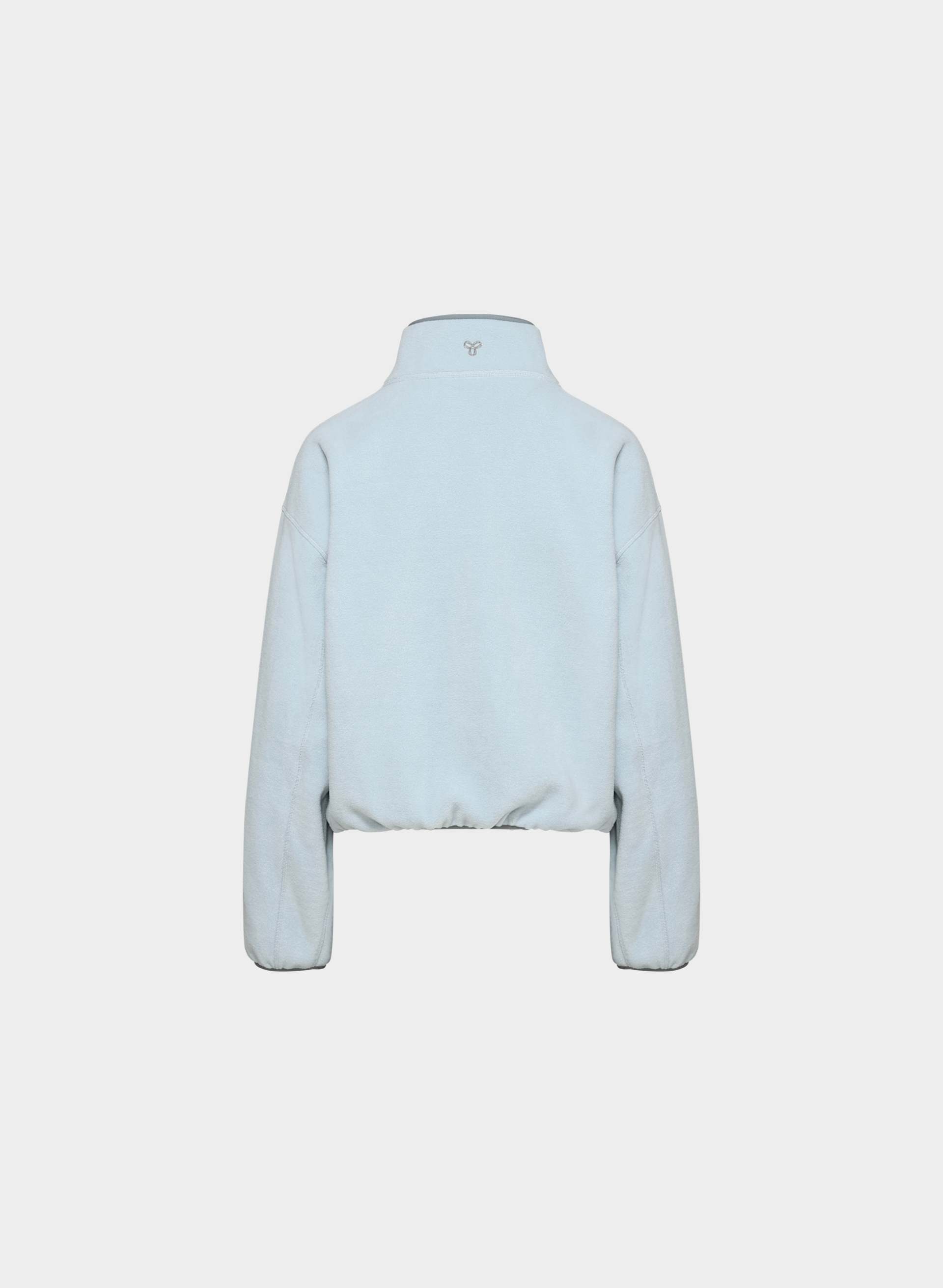 CHANDAIL TERRAIN À DEMI-FERMETURE ÉCLAIR | Aritzia