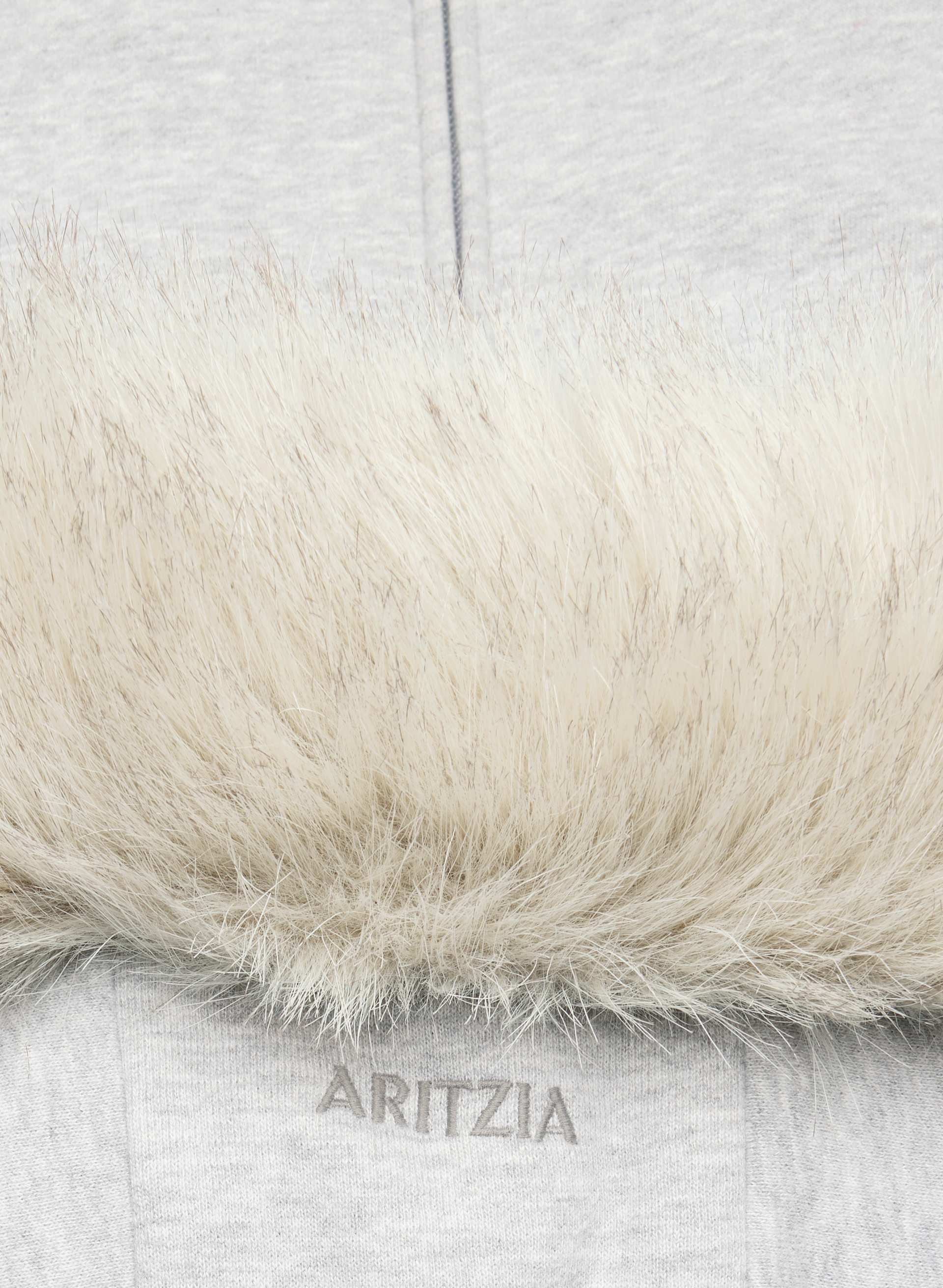 CHANDAIL MÉGA CAP. FERM. ÉCL. - MOLL. DOUILL. | Aritzia