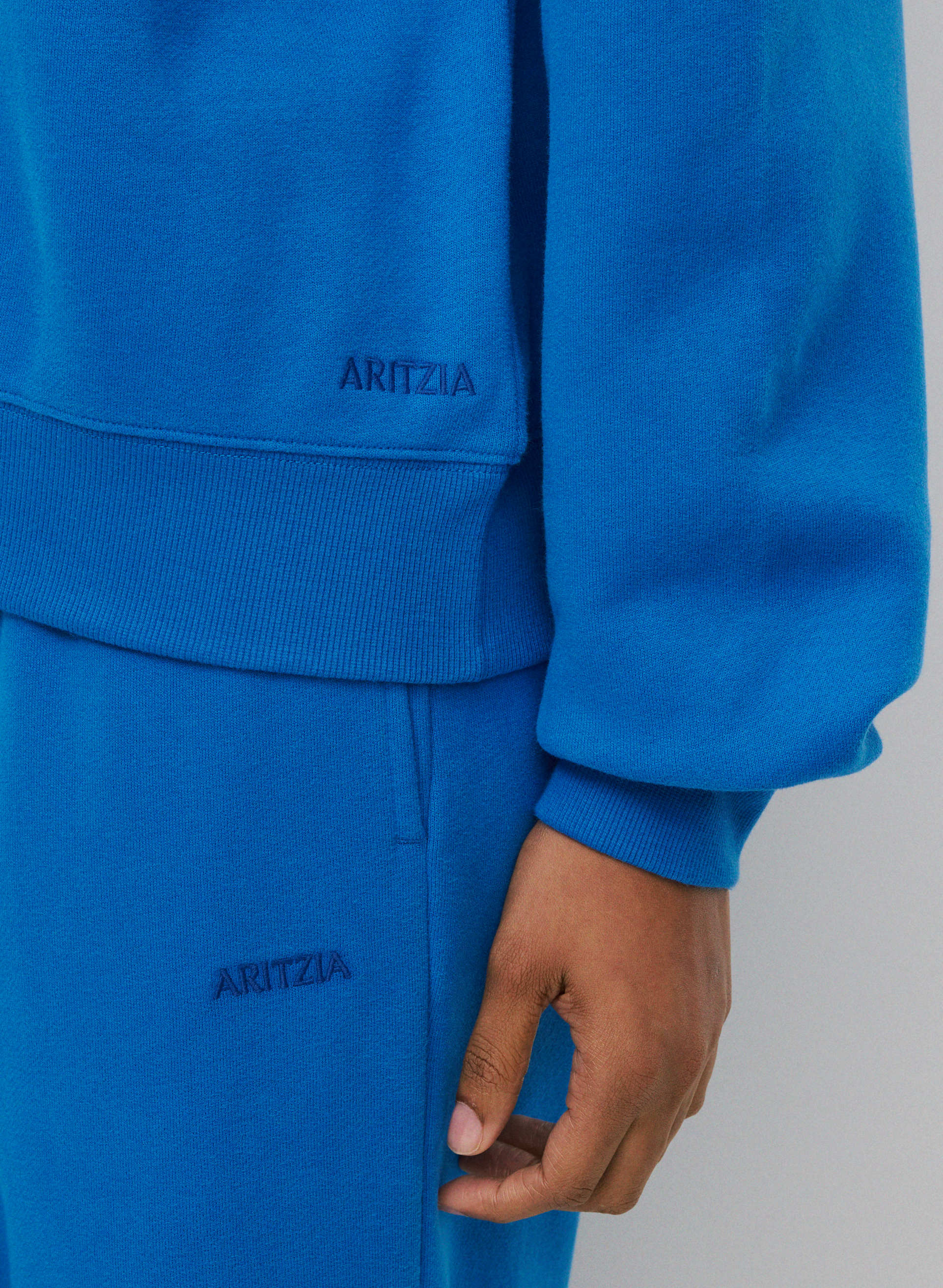 COZY SWEATFLEECE BF OFF-SHOULDER SWEATSHIRT | Aritzia