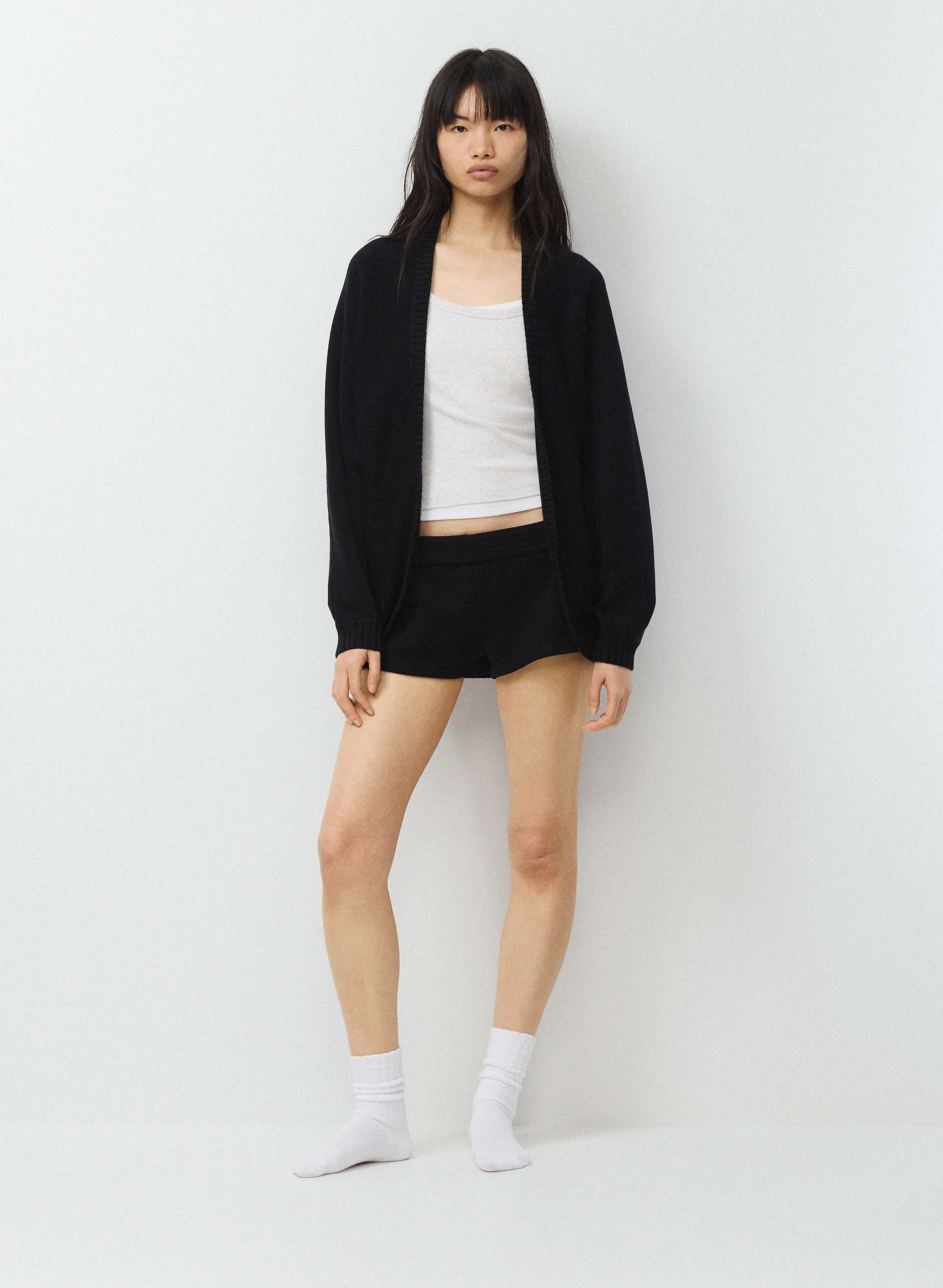 GRAMERCY BELOW BUM SHRUG | Aritzia