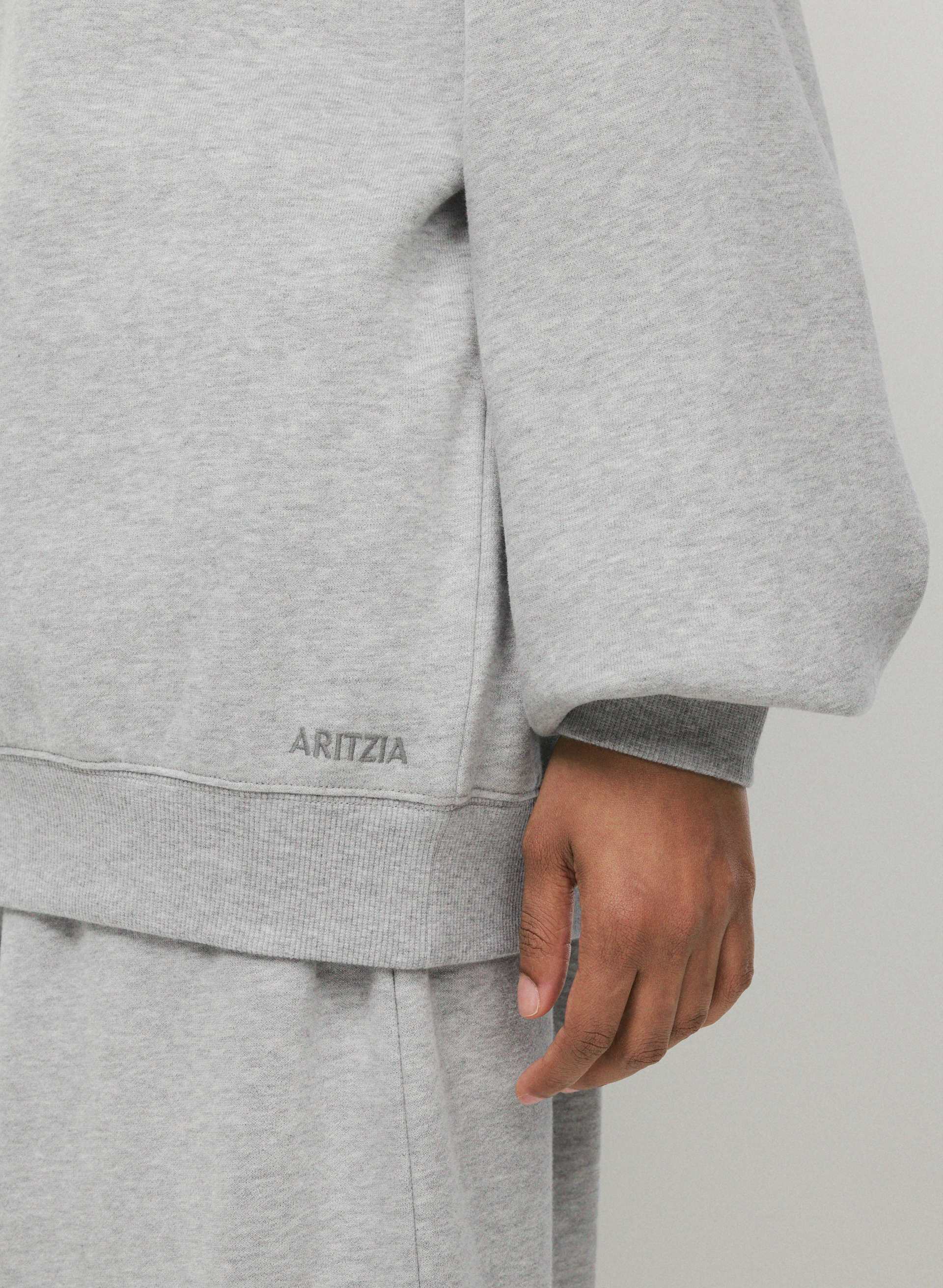 COZY SWEATFLEECE MEGA OFF-SHOULDER SWEATSHIRT | Aritzia