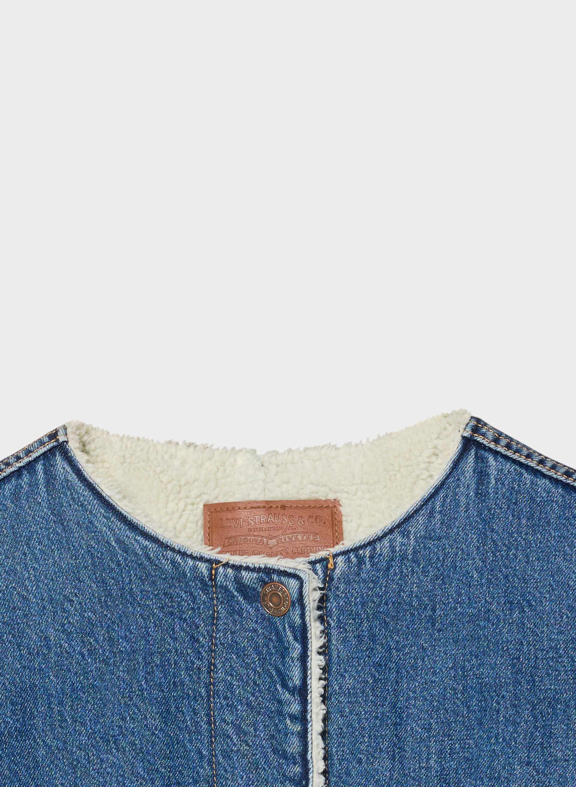 COLLARLESS CROP SHERPA TRUCKER JACKET | Aritzia
