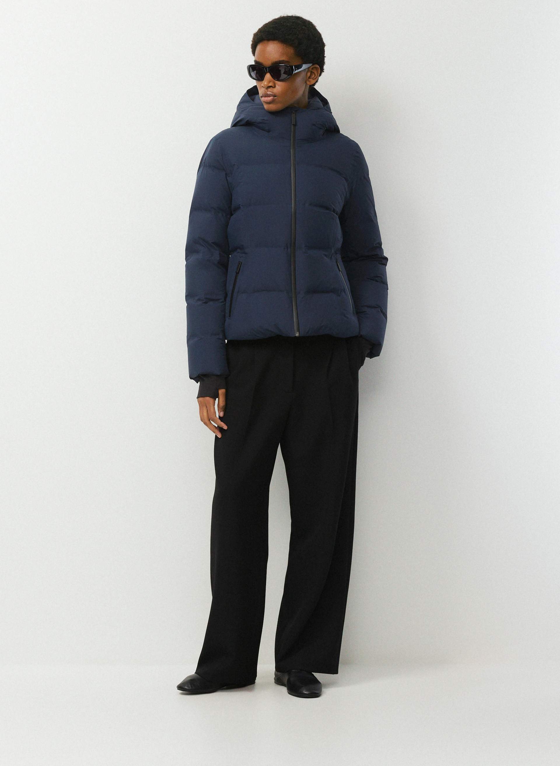 THE SUPERSNUG PUFF₂O™ - RAINSTOP™ - Rainstop™ waterproof slim-fit 800+ fill-power premium down puffer jacket. 