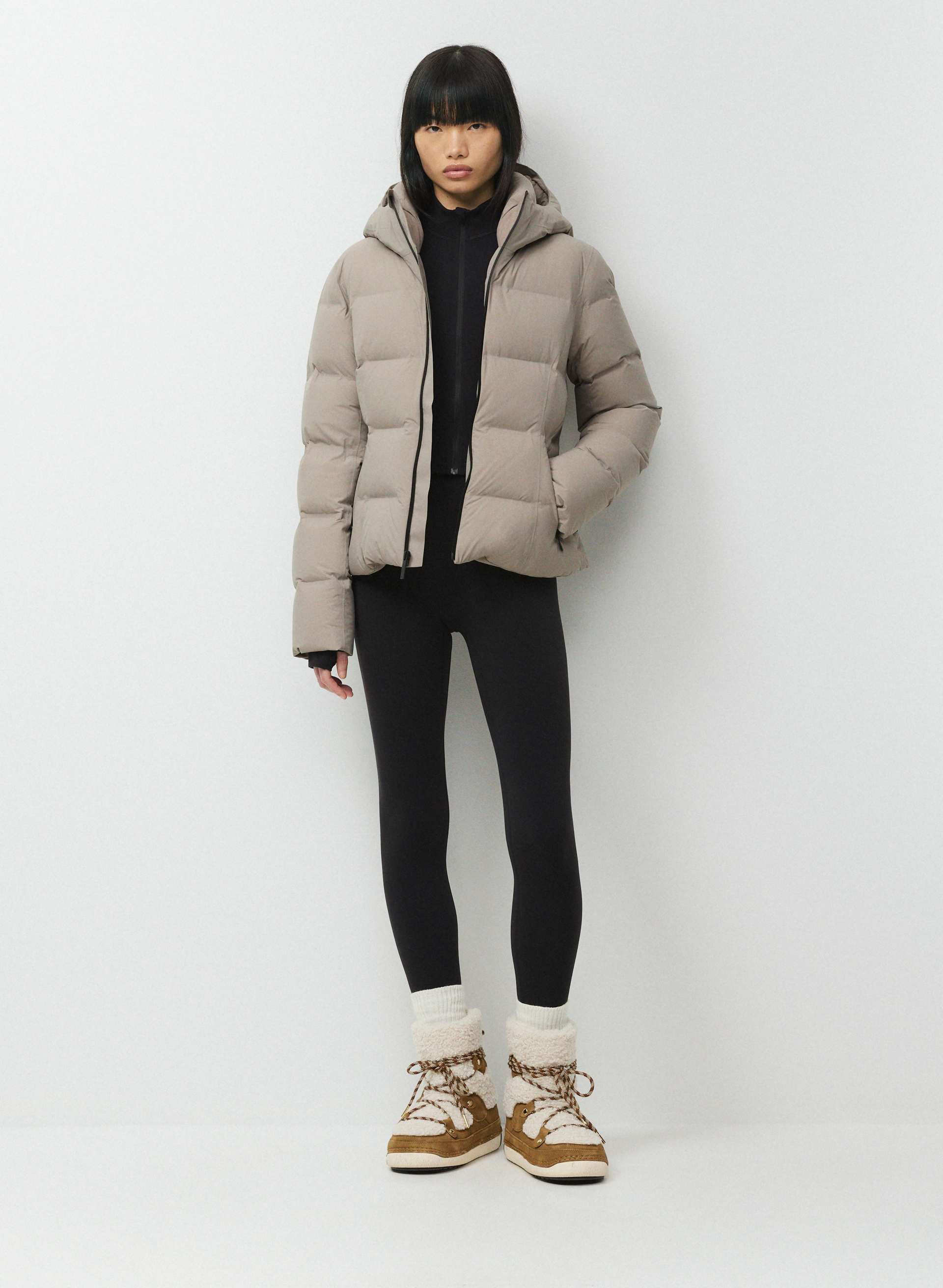 THE SUPERSNUG PUFF₂O™ - RAINSTOP™ - Rainstop™ waterproof slim-fit 800+ fill-power premium down puffer jacket. 