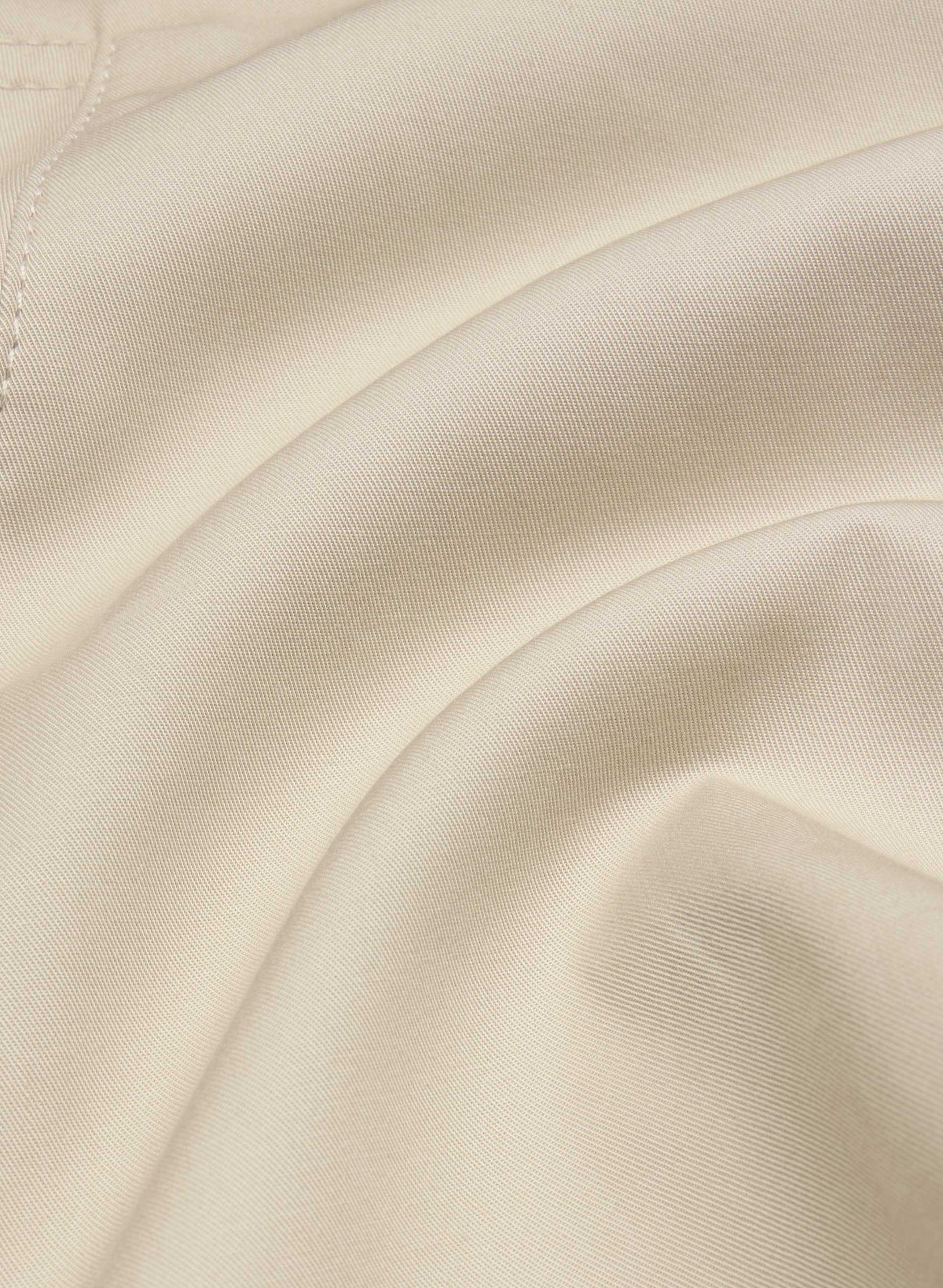 THE FINCH SHORT TRENCH COAT | Aritzia