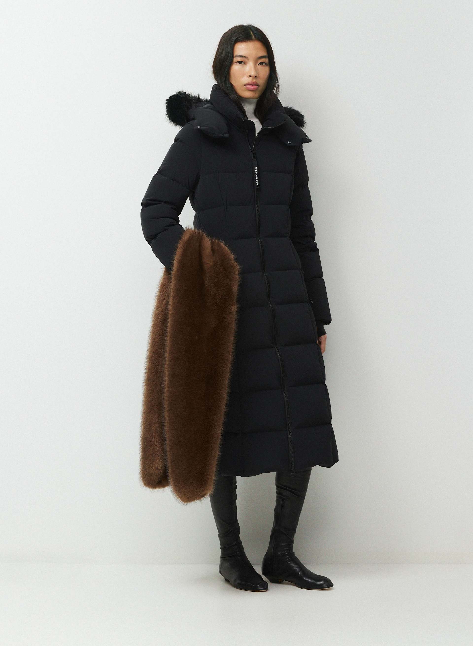 THE SUPERSNUG PUFF™ LONG - ORBIT STRETCH™ - Water-repellent stretchy slim-fit 800+ fill power premium down long puffer jacket. 