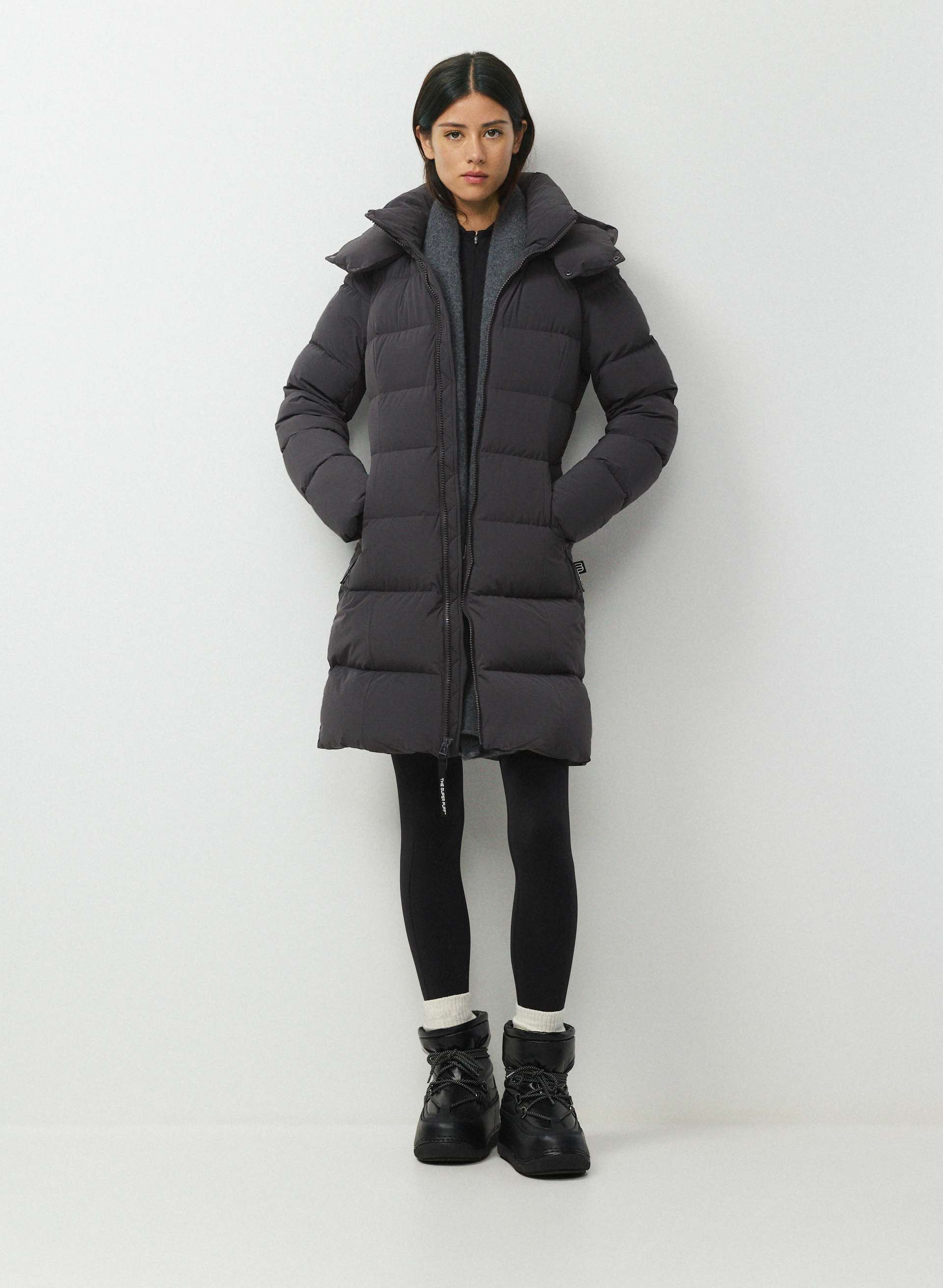 THE SUPERSNUG PUFF™ MID - ORBIT STRETCH™ - Water-repellent stretchy slim-fit  800+ fill power premium down mid-length puffer jacket. 