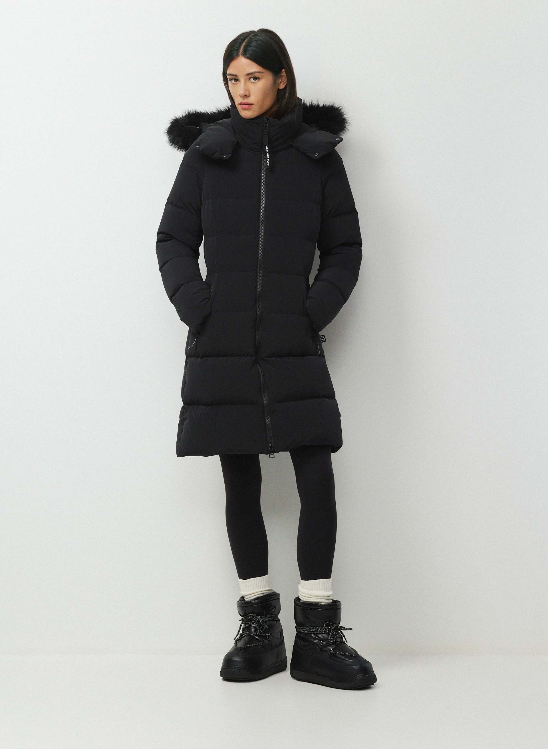 THE SUPERSNUG PUFF™ MID - ORBIT STRETCH™ - Water-repellent stretchy slim-fit  800+ fill power premium down mid-length puffer jacket. 