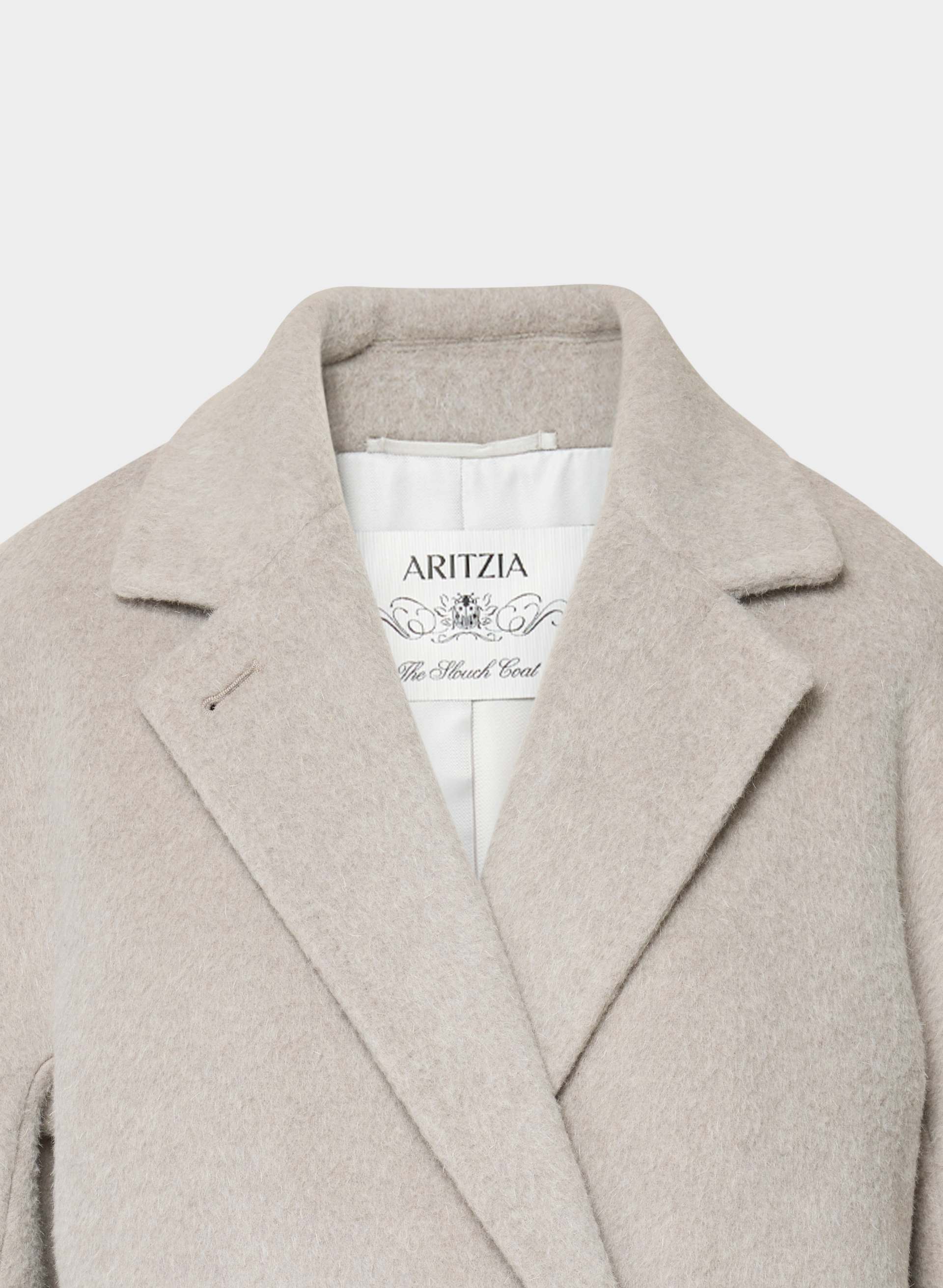 THE SLOUCH™ COAT | Aritzia