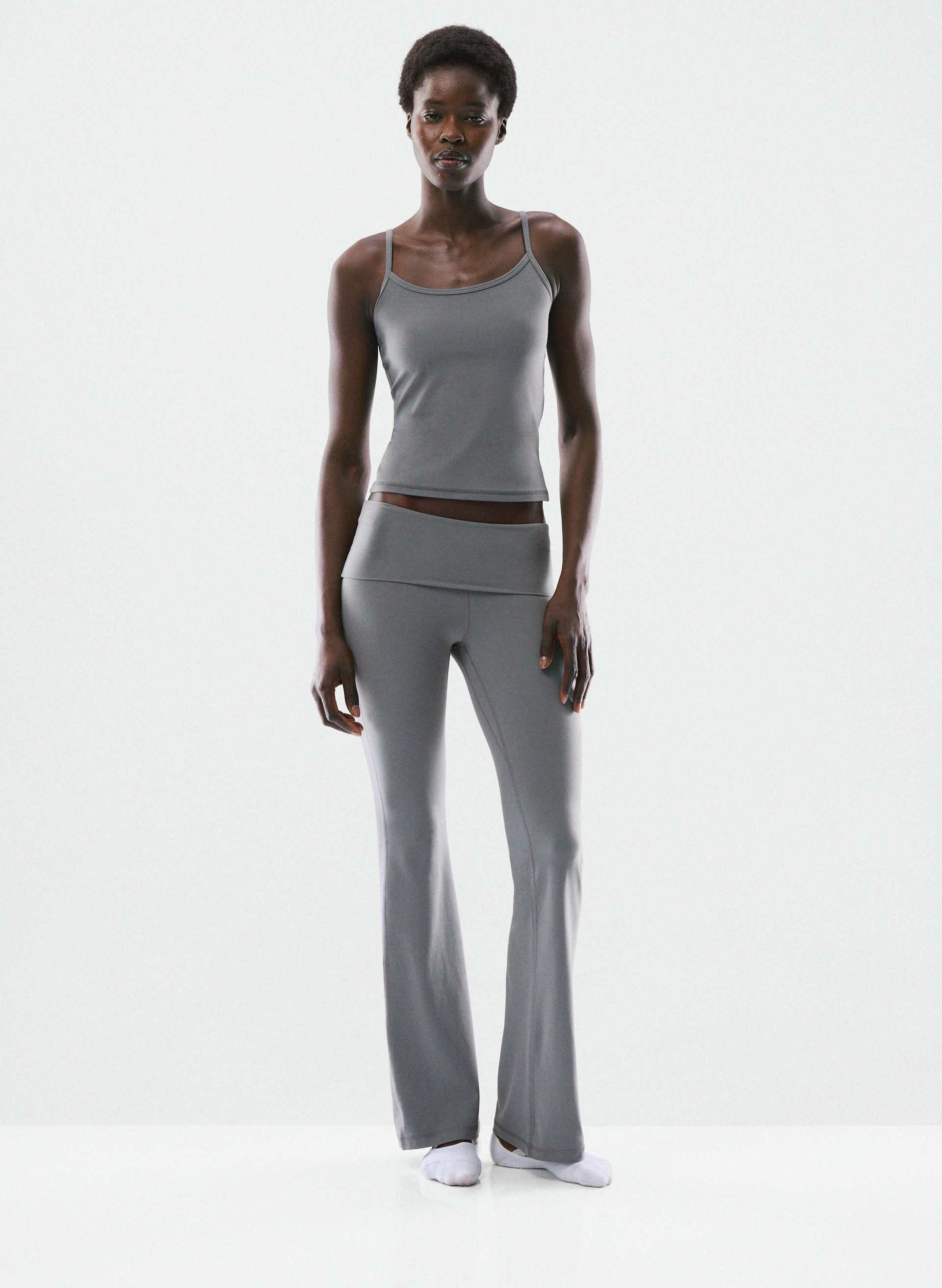 BUTTER FOLDOVER FLARE 32" LEGGING - Sweat-wicking low-rise flared leggings with a foldover waistband. 