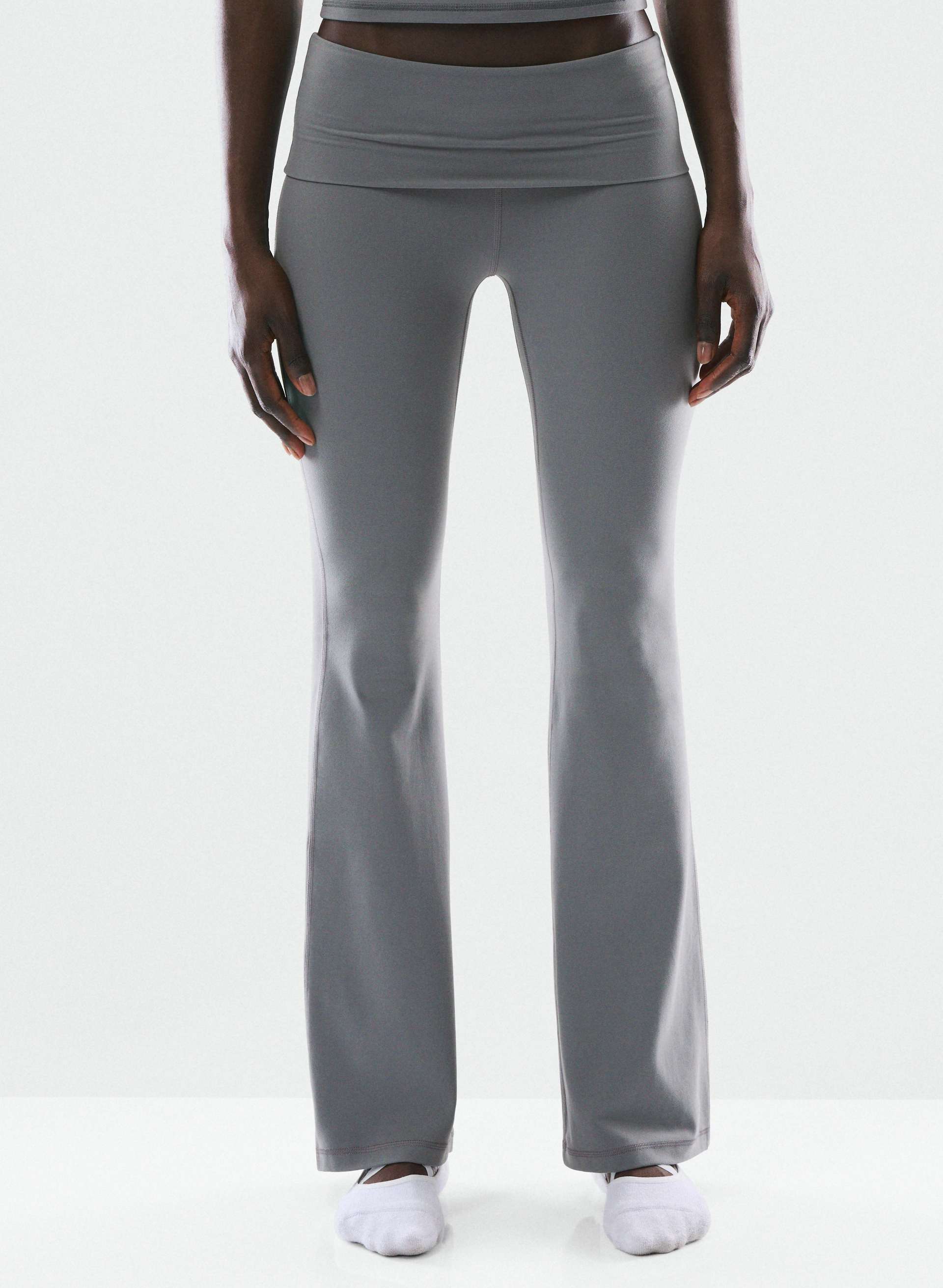 BUTTER FOLDOVER FLARE 32" LEGGING - Sweat-wicking low-rise flared leggings with a foldover waistband. 