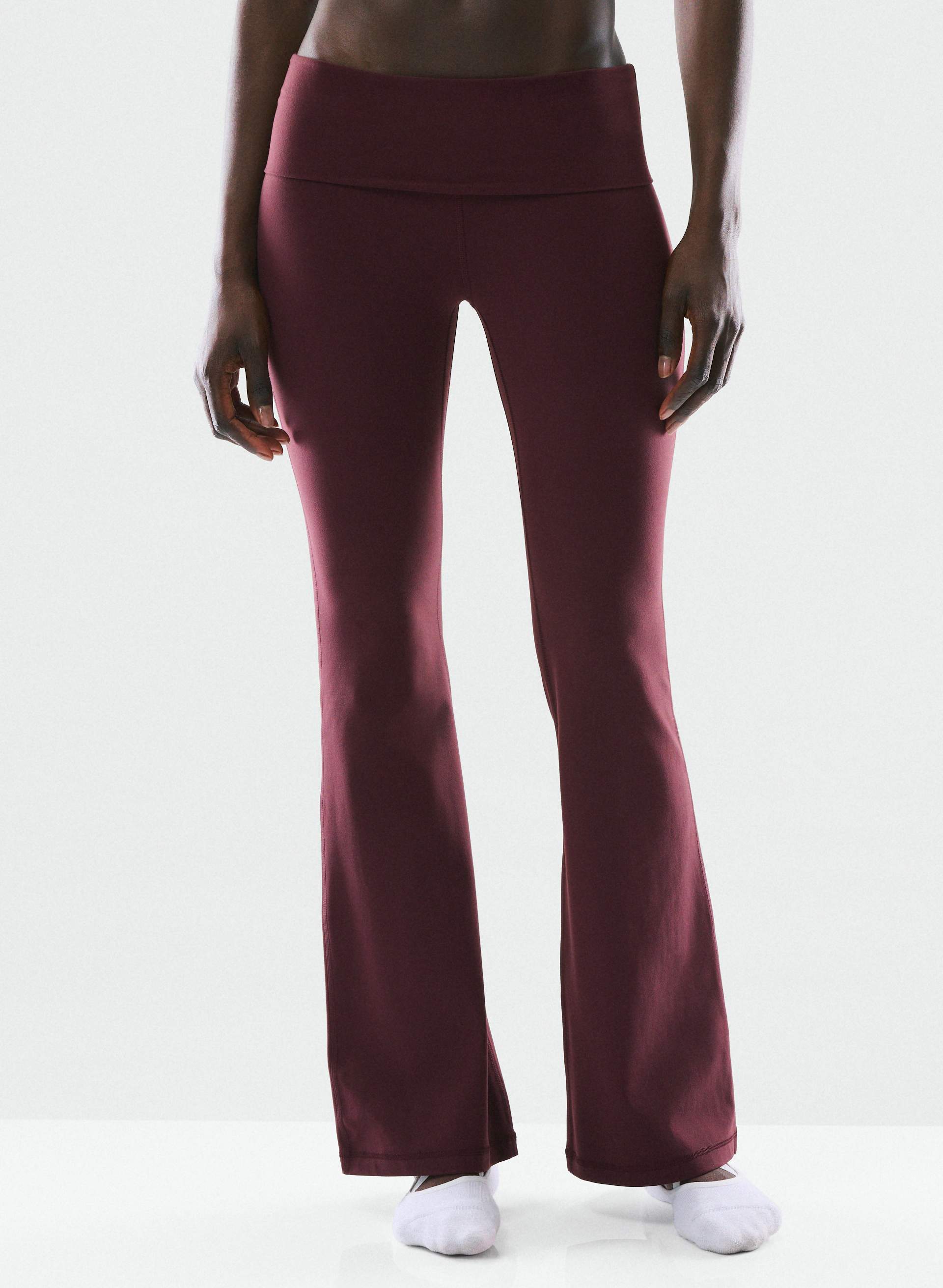 BUTTER FOLDOVER FLARE 32" LEGGING - Sweat-wicking low-rise flared leggings with a foldover waistband. 