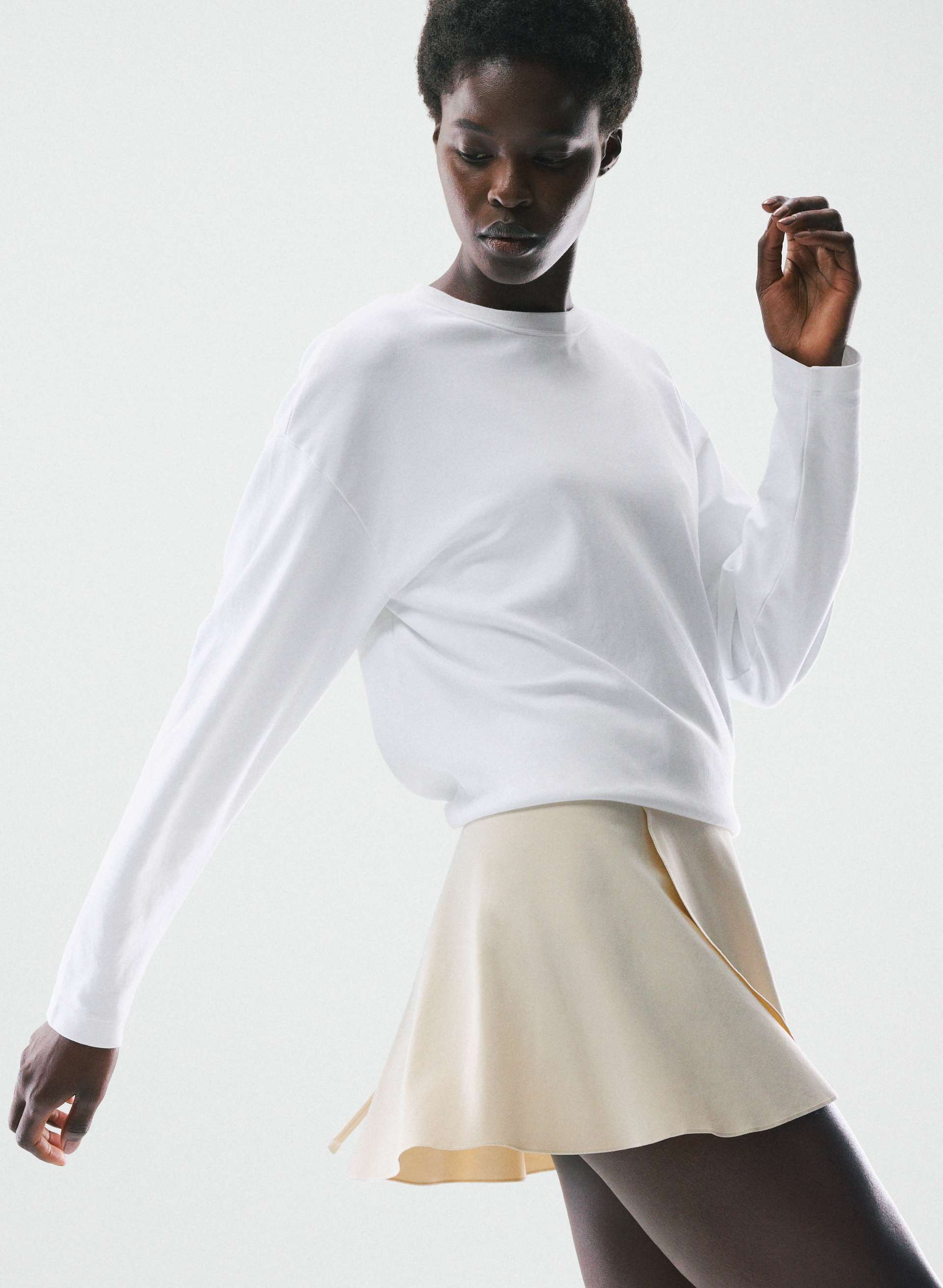 BUTTER SPRING WRAP SKIRT | Aritzia