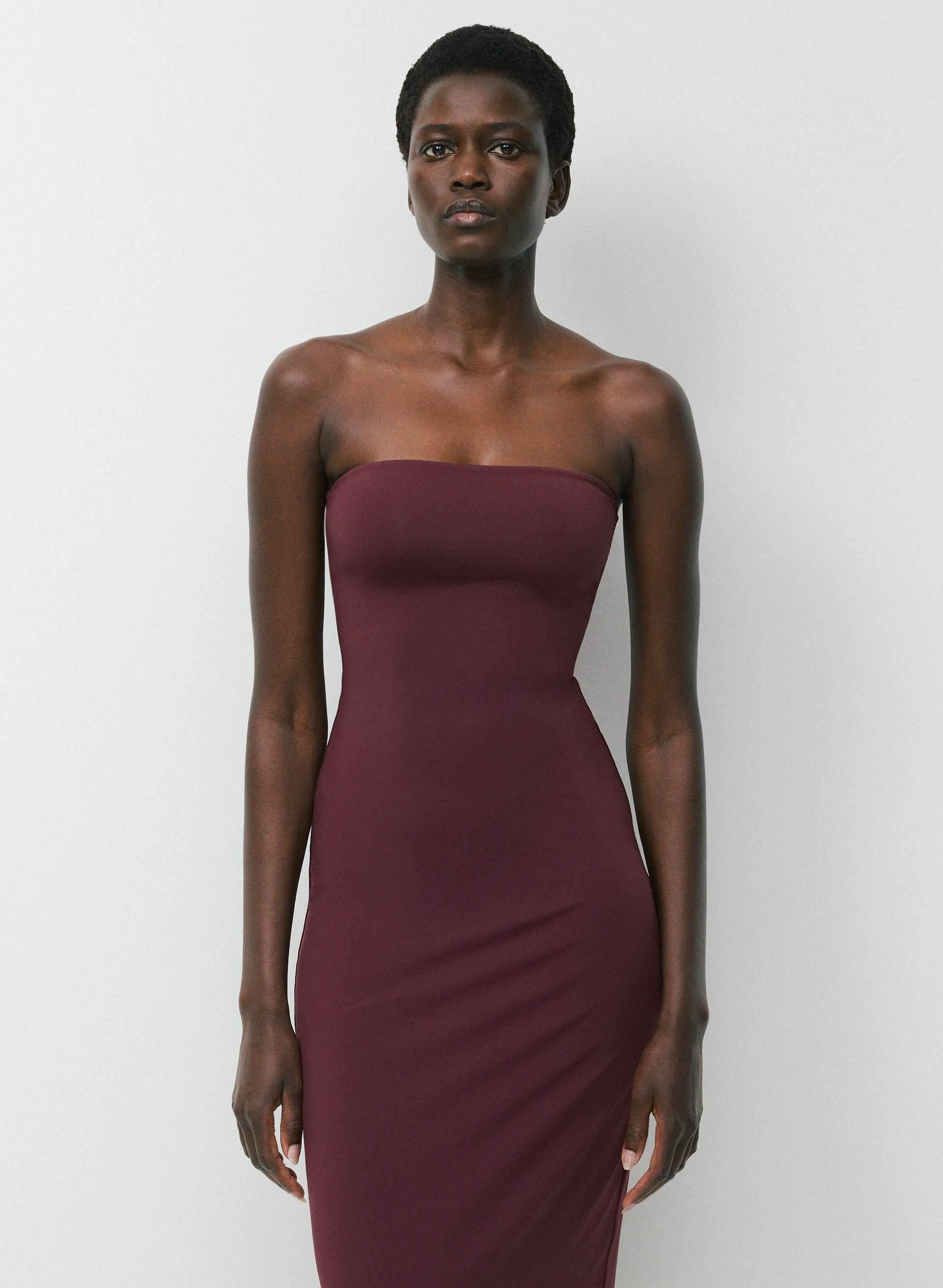 burgundy tube dress Sashi Textured Knit The Hannah Tube Dress in Burgundy features a fitted tube top with scrunch detailing Burgundy Leather Tube Dress