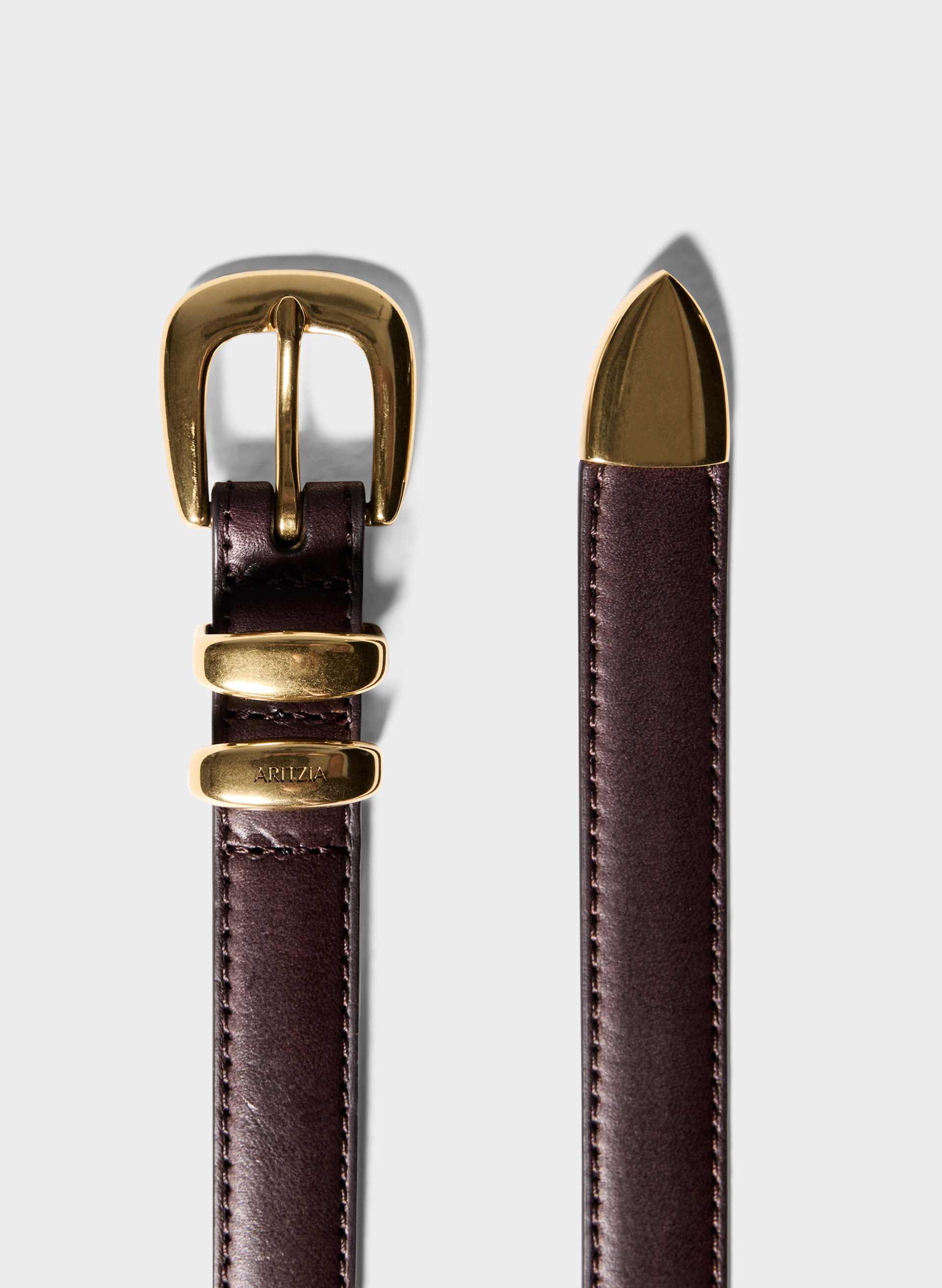 LEGENDARY SOLID BRASS LEATHER SLIM BELT | Aritzia