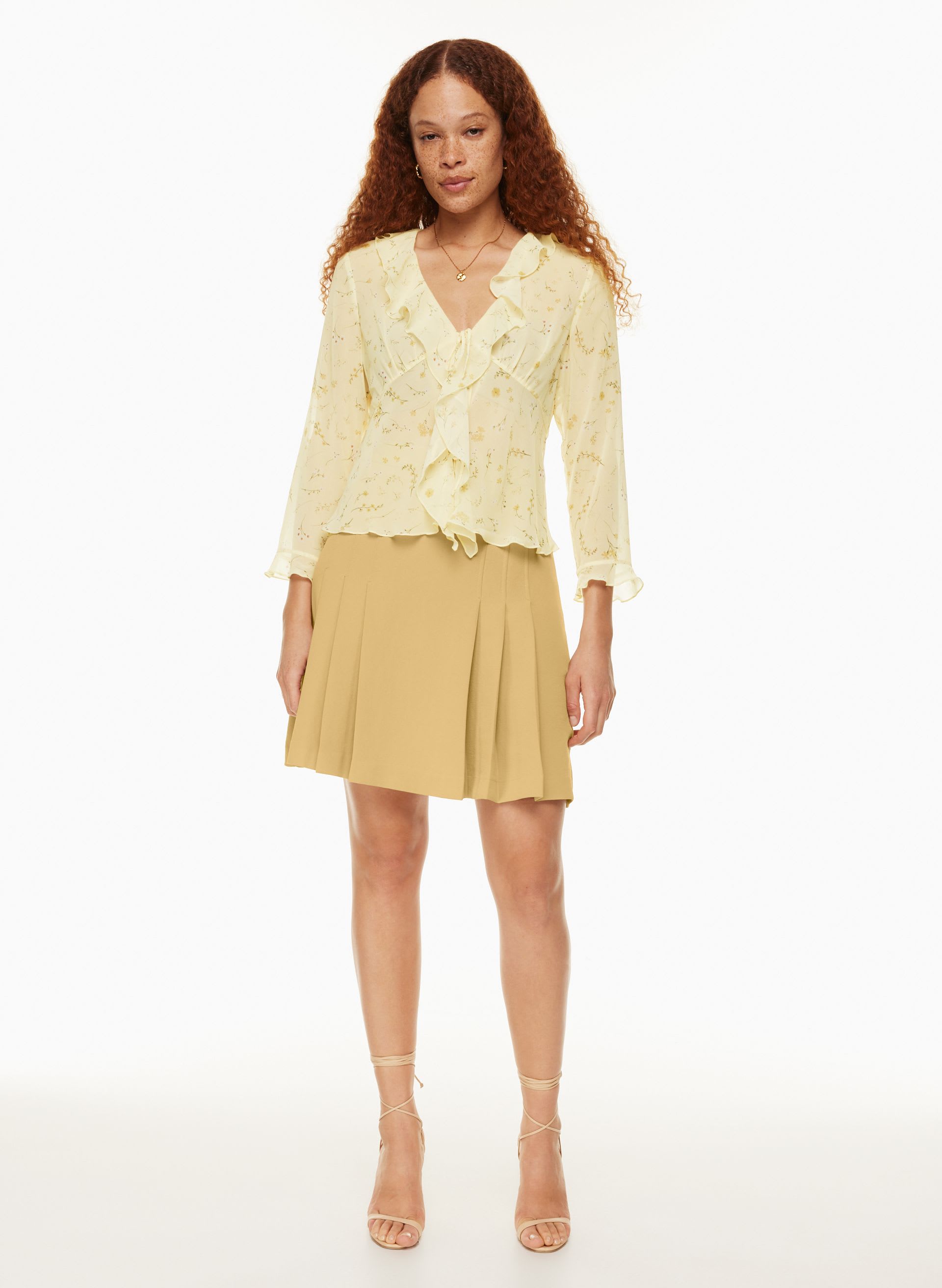 JUPE PLISSÉE TAPESTRY | Aritzia