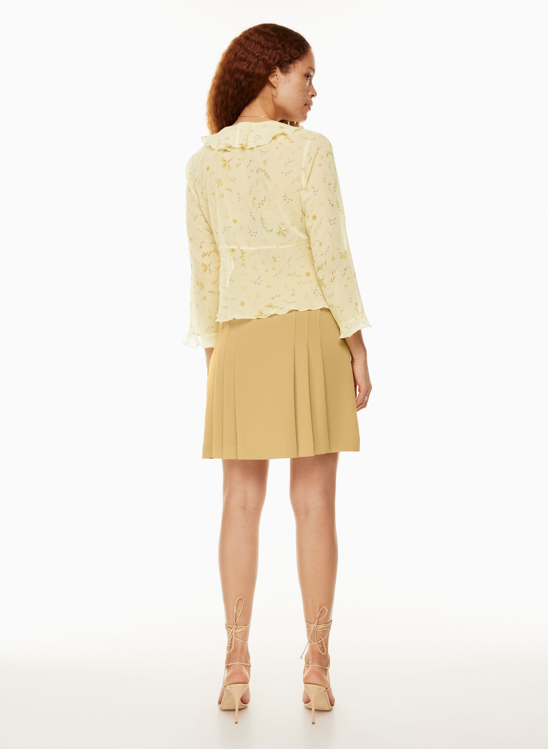JUPE PLISSÉE TAPESTRY | Aritzia