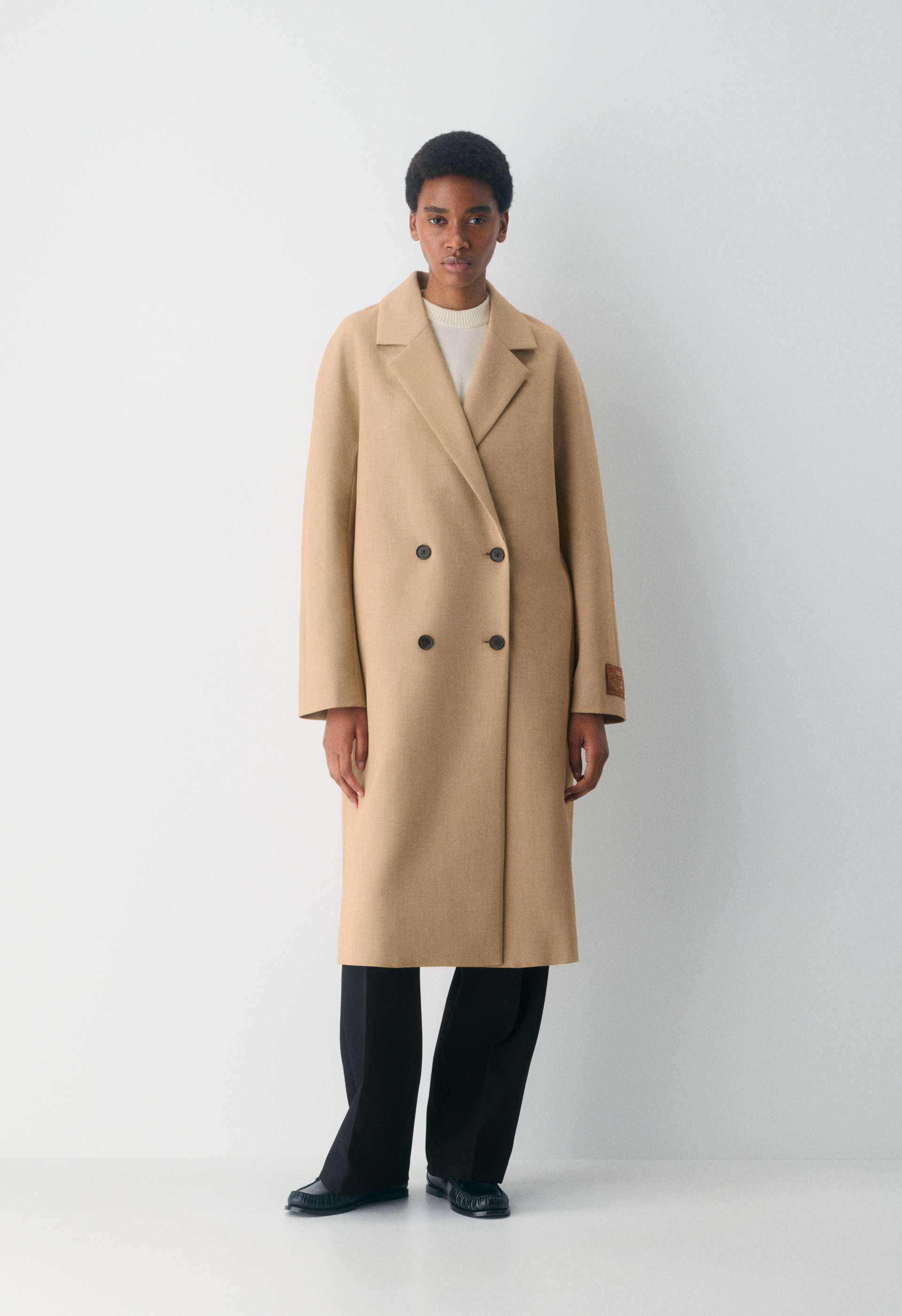 The Slouch™ Coat - (Re)ssential | Aritzia US