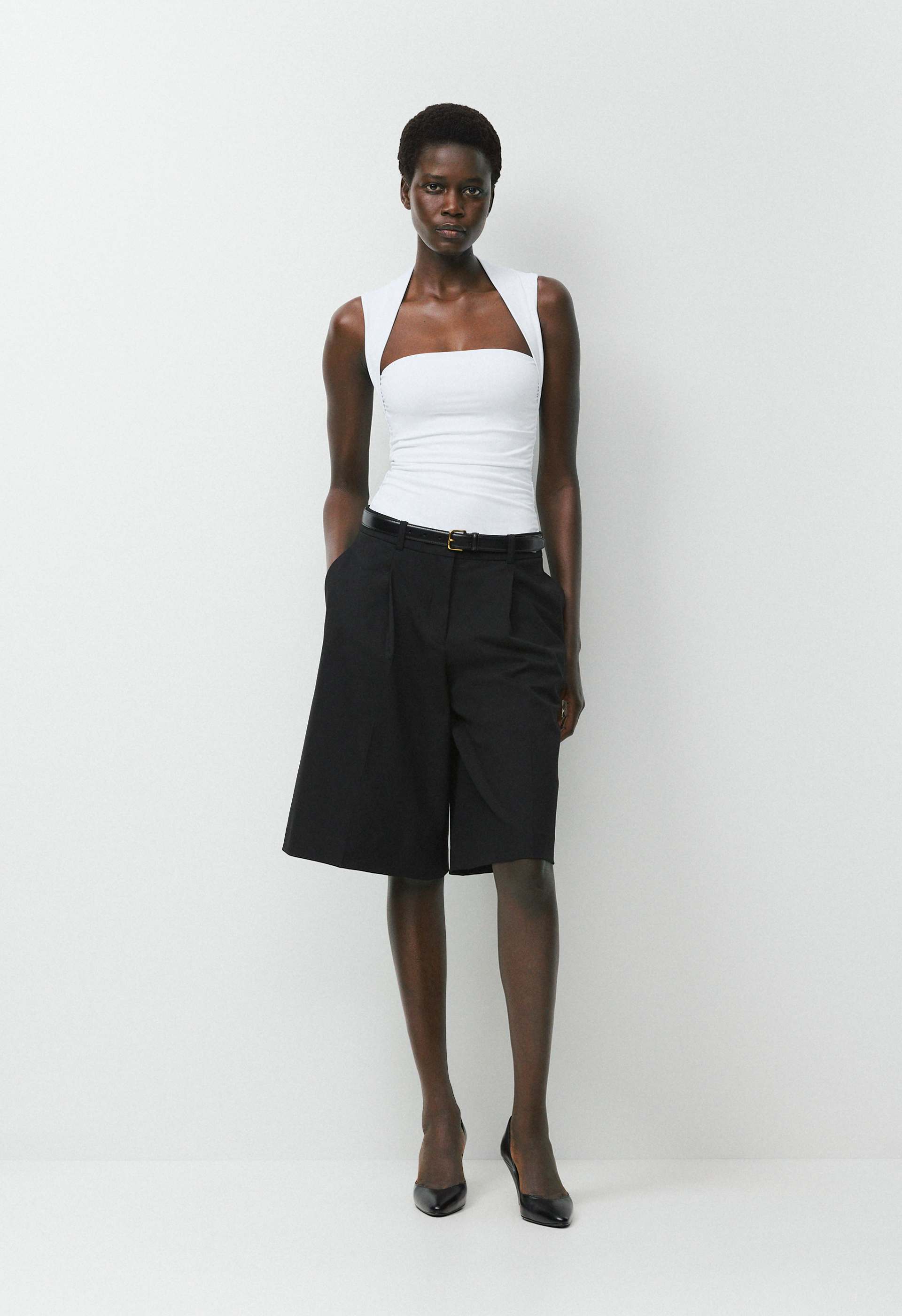 o9jy…mam Original Contour Flourish Top | Aritzia US