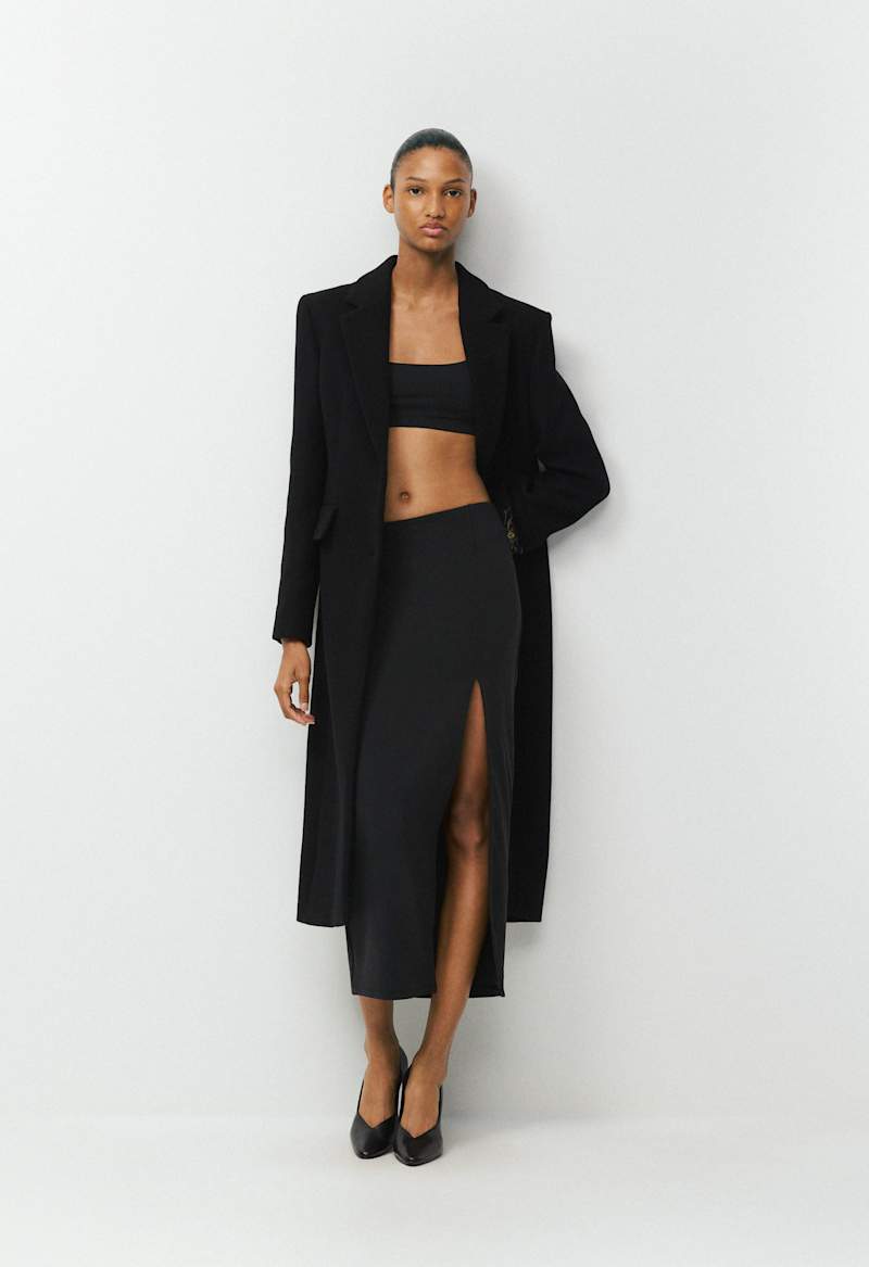 Original Contour Proximity Skirt by Aritzia